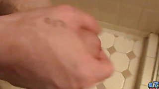 Thug with tattoos stroking his big dick in bathroom