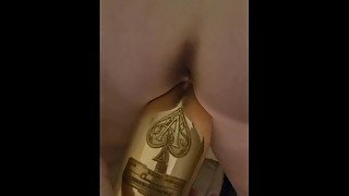 Horny milf stuff champange bottle in her pussy...AND LIKES IT