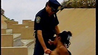 Slutty ebony babe with natural tits banged by a dirty policeman