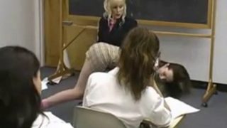 Girl is spanked in front of the class