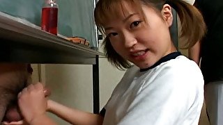 Funky Japanese college chick gives proper handjob