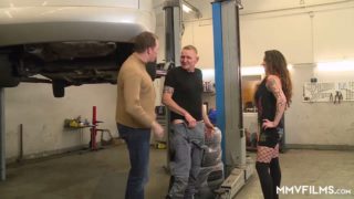 Two mechanics fucking whore in the spacious garage