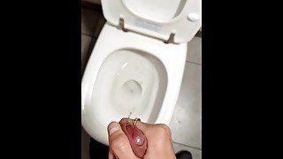 Teen boy jerks off in the public toilet Understall and make cum