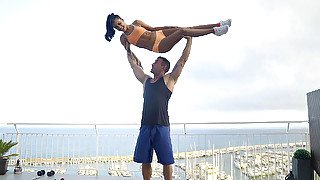 Apolonia Lapiedra and her private trainer are working out on the rooftop