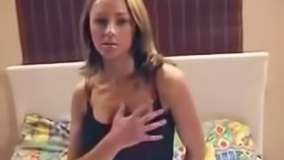 Busty brunette plays with sex toys