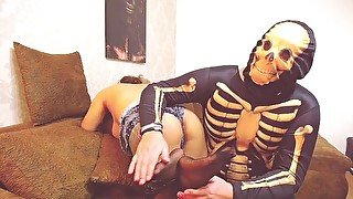 Horny skeleton plays with teen and spank her hot ass