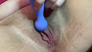 Vibrating my unshaven pussy while my family is in the living room