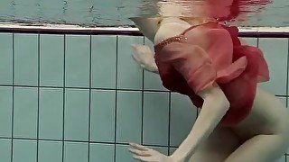 Katya Okuneva in red dress erotic water show