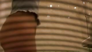 Bubble butt brunette captured on a shower spy cam