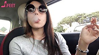 Petra smoking in car