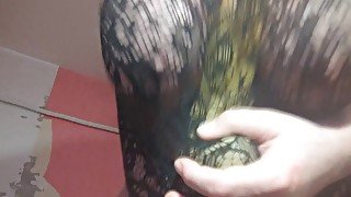 Titjob through fishnet dress