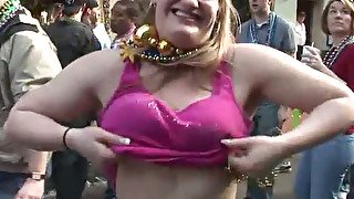 Fuck hungry mature sluts show off their saggy boobies in public during festival