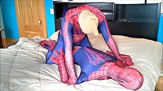 masked spiderman struggles against spiderman