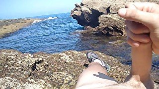 Jerking off a Big Hard Dick Overlooking the Sea in the Cove until he Cums