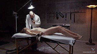 Tied up patient enjoys having her pussy pleasured by a doctor