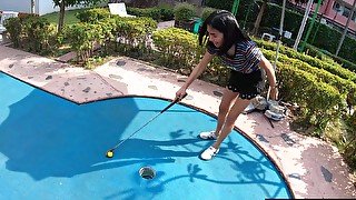 Amateur Thai teen really bad at minigolf