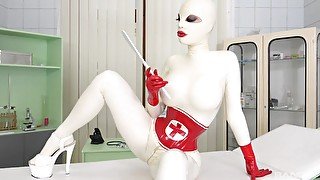 Kinky solo masturbation act on the hospital bed with Lucy Latex