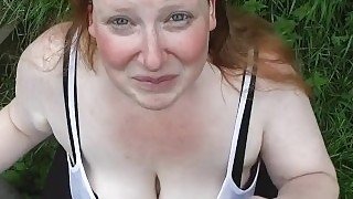 Fat Redhead Curly getting pissed in Her Whore Face in the garden!