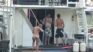 Amateur babes in bikinis dance and get crazy on a yacht