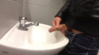 Dirty boy Pissing in public sink