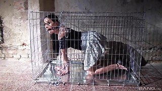 Caged slut roughly fucked after being gagged and spanked