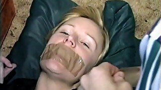 Blonde Bound And Tape Gagged On The Floo