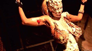 Kelly Madison covered in cake while masturbating with her hands