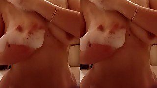 I touch myself in the bathroom showing my boobs and pussy.