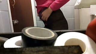 The ass of amateur spied while her pissing on toilet