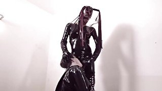 Latex tgirl pounding slaves ass