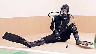 Scuba masturbating with full face mask in neoprene wetsuit