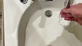 Peeing on bathroom sink