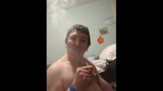 Blowing some clouds and pulling on my cock! 