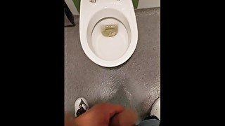 Horny Guy Pissing and Jerking Off at Public Toilet