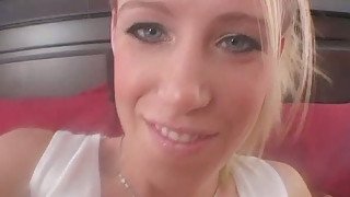 Young slutty blondie gives hot foot fuck to fake cock lying in bed