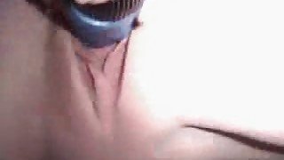 My lady fondles her soaking pussy with blue vibrator