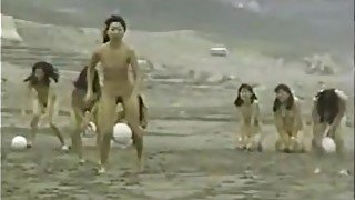 Naked Women Race Across The Beach With A Ball Between Their