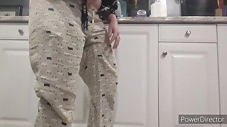 Desperate Wife Soaks Pants While Doing Dishes