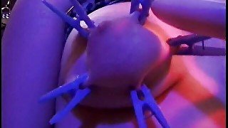 Horny dude teases his slaves big tits with clothes pegs