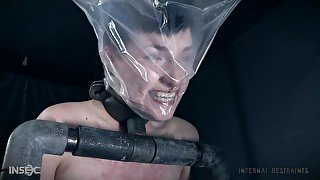 BDSM torture for short haired brunette Kitty Dorian tied to the floor