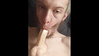 Skinny teen deepthroats and Gags on his 7 inch dildo