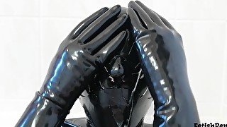 Saliva mess in latex mask and gloves