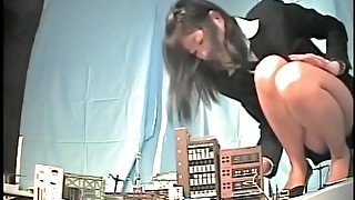 Asian giantess crushes city in heels