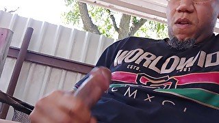 Jacking off in the backyard. Cumming on the table