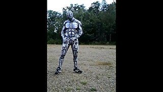 Spandex android jerking off inside spandex outdoors