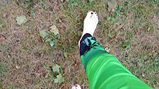 POV Earthing my feet indian style on a table at the park