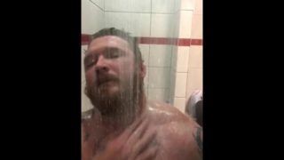 Stud in the shower playing with cock