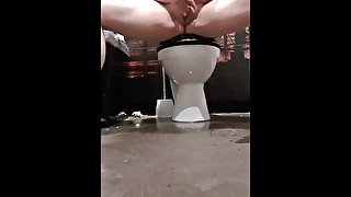 Masturbating and squirting piss on the floor in TGI Fridays