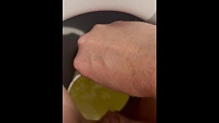 Desperate piss in a large McDonald’s cup overflowing