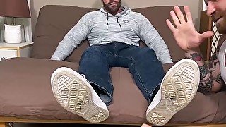 Gay stud jerks off during foot licking